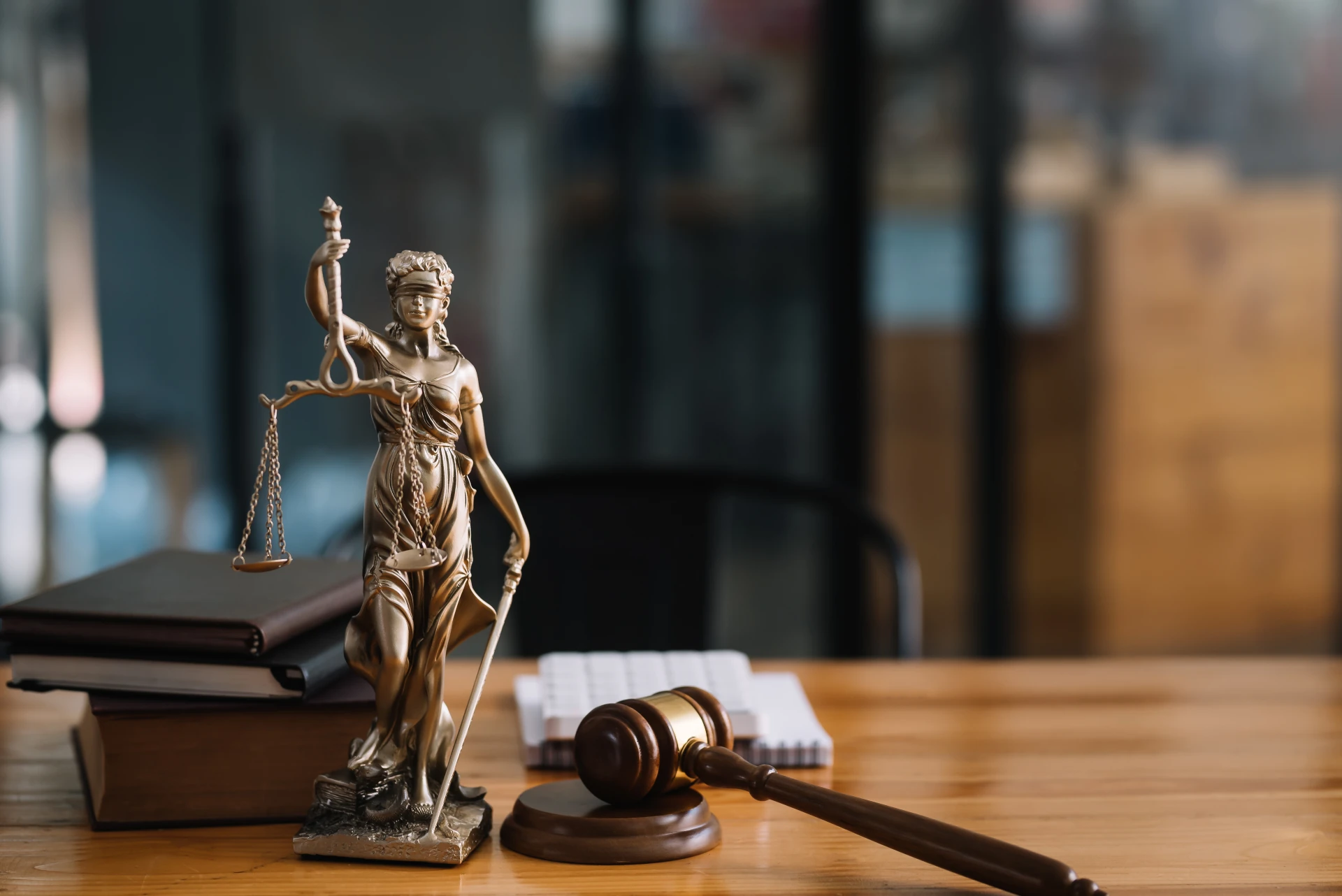 Statue of lady justice on desk of a judge or lawyer. Photo: Getty Images