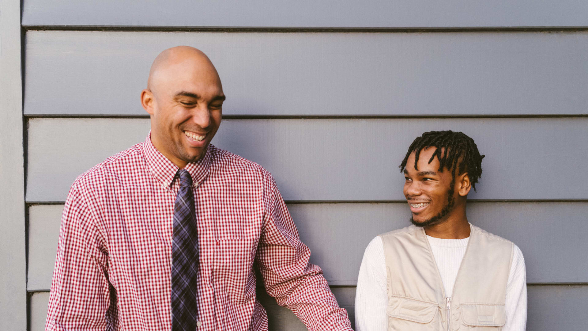 “We invest in our young people because they have an immense capacity to do better, not just for themselves but also for their communities,” says the Hidden Genius Project’s Brandon Nicholson, pictured left, with student Perry Irving.
