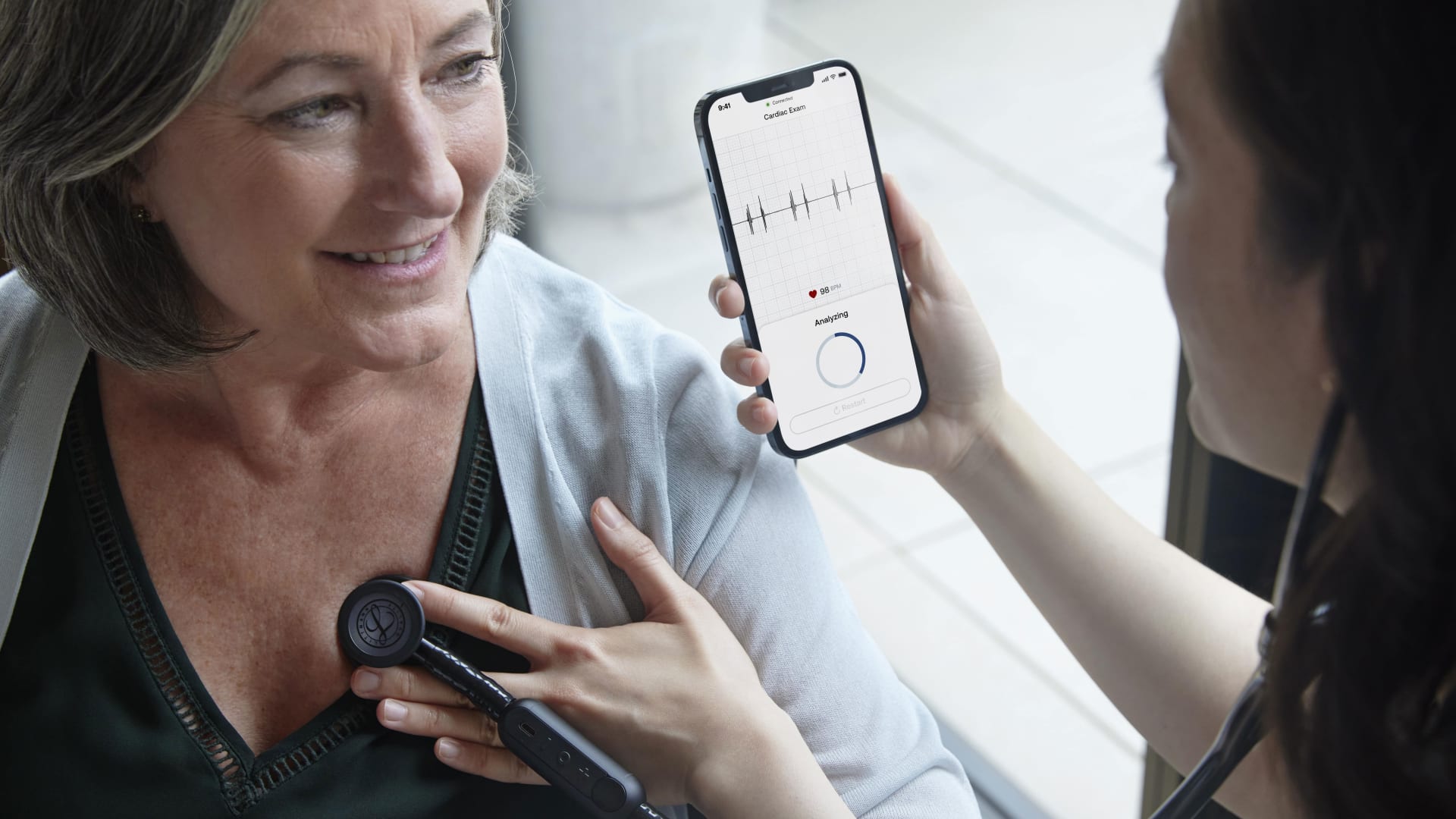 An Eko stethoscope paired with its mobile app.