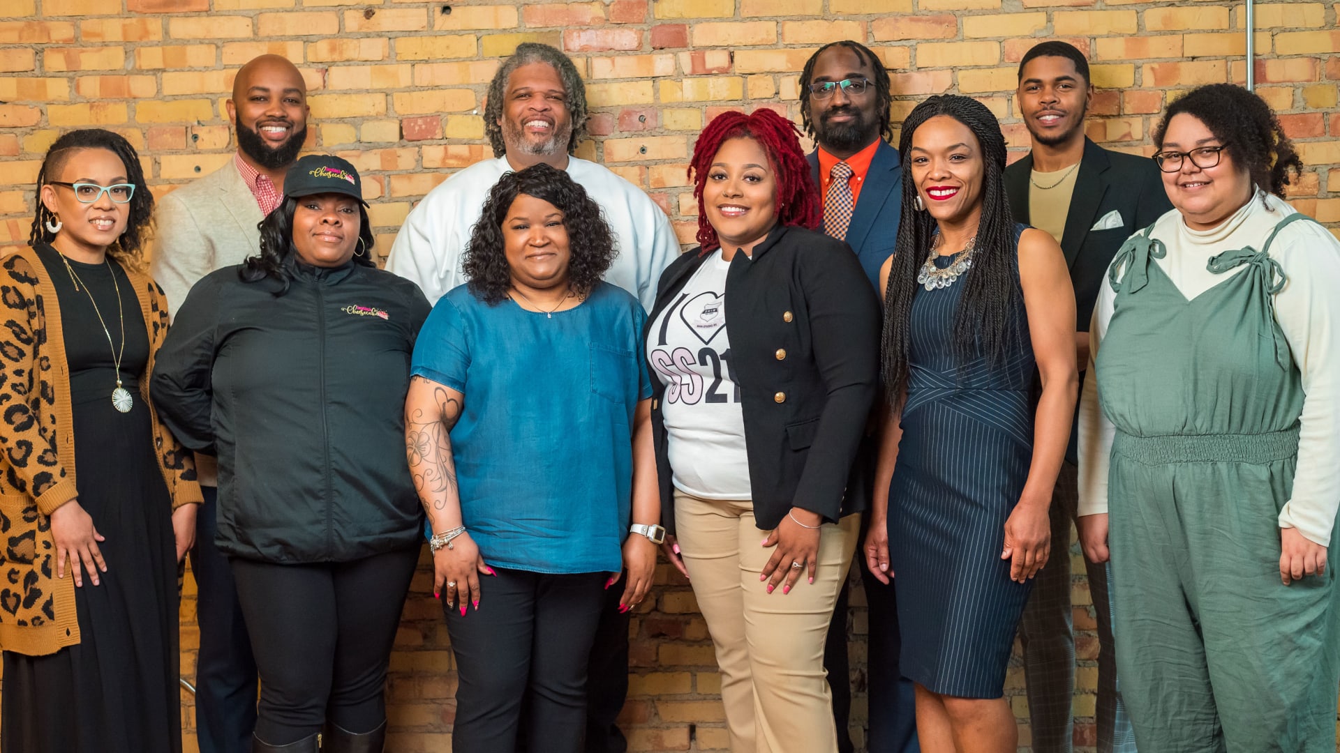Tony Willis (top row, far left) launched Lansing Economic Area Partnership's Elevate accelerator with a $120,000 grant. The first cohort includes (back to front, left to right) Marcus Leslie, Donald Lovell, Sydney McCalib, Tiffany Norde, Deanna Ray Brown, Eva Thompson, Lorin Cumberbatch, and Nikki Thompson Frazier. Juliette Givehan, an equity specialist at LEAP, is pictured far right.