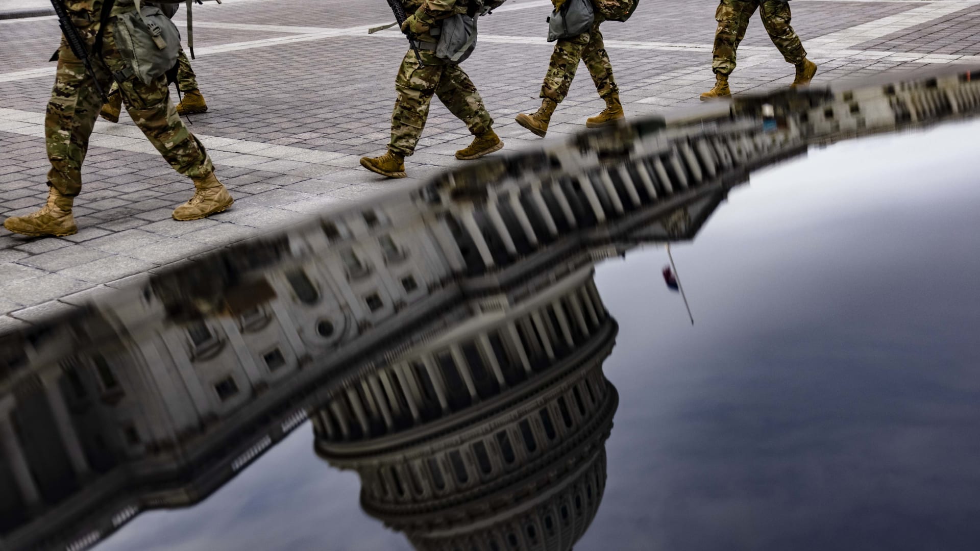 Virginia National Guard soldiers march at the U.S. Capitol on their way to their guard posts on January 16, 2021, in Washington, D.C. After last week's riots at the U.S. Capitol Building, the FBI has warned of additional threats in the nation's capital and in all 50 states. According to reports, as many as 25,000 National Guard soldiers will be guarding the city as preparations are made for the inauguration of Joe Biden as the 46th U.S. president.