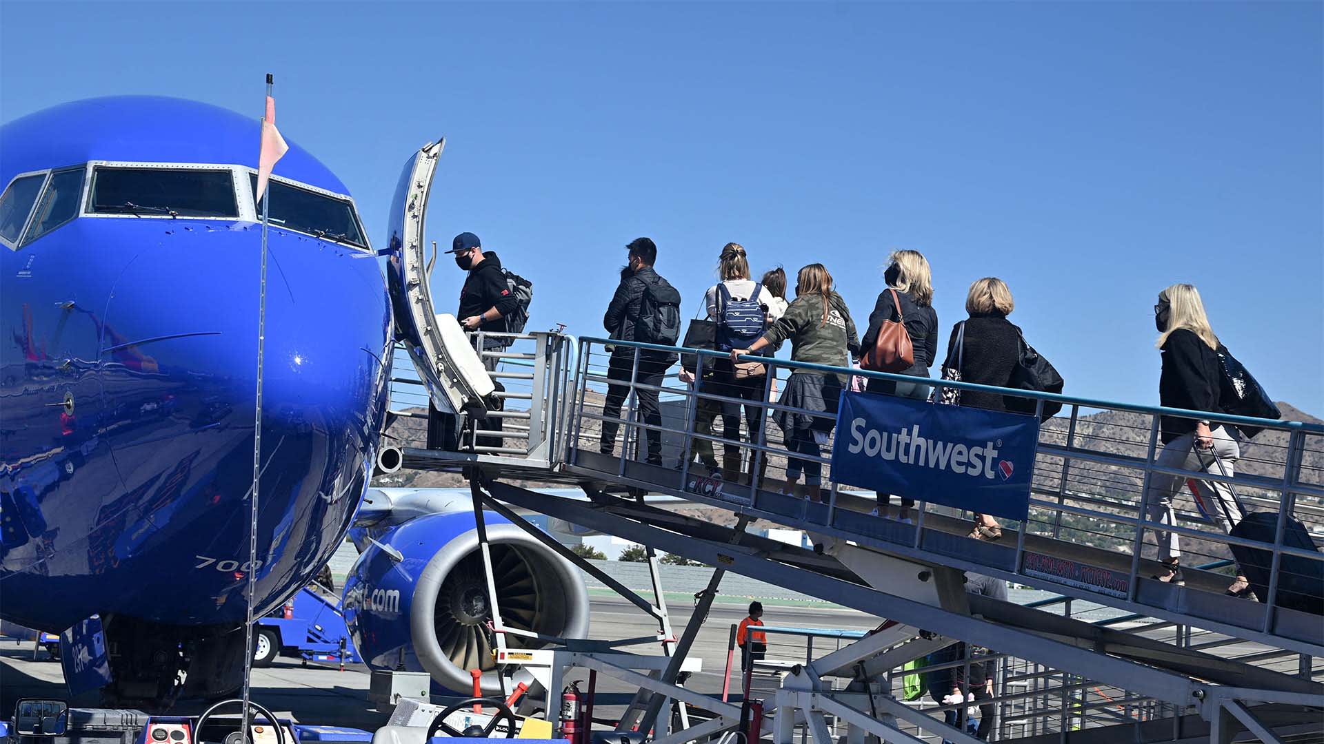 Passengers board a Southwest Airlines airplane in Burbank, California. 