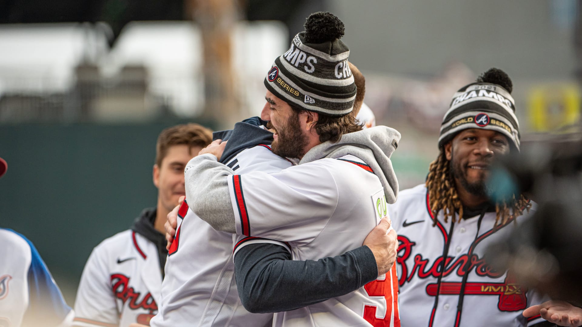 Atlanta Braves first baseman Freddie Freeman (left) hugging shortstop Dansby Swanson.