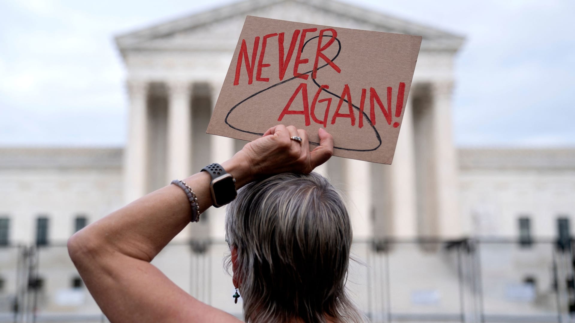 A pro-choice demonstrator holds up a sign in front of the U.S. Supreme Court on May 11. 