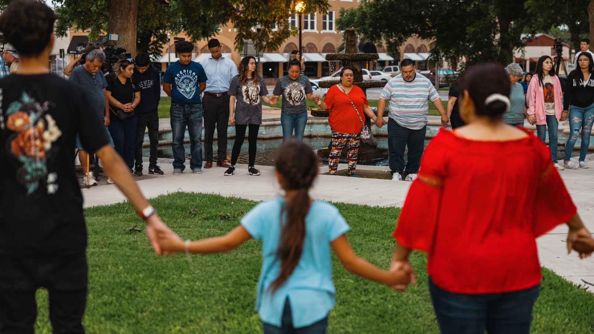 Members of the community gather for a prayer vigil in the wake of a mass shooting at Robb Elementary School on May 24, 2022, in Uvalde, Texas.