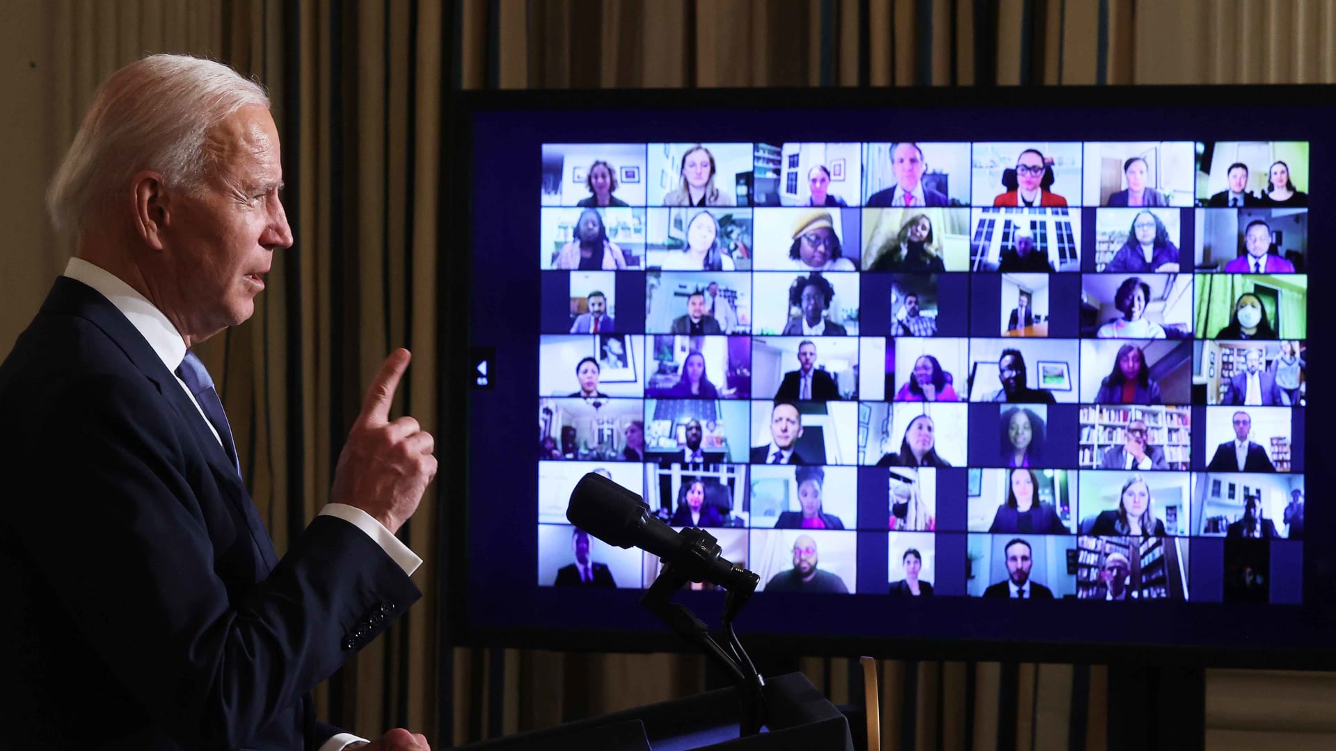 President Joe Biden conducts a virtual swearing-in ceremony for members of his new administration via Zoom just hours after his inauguration in the State Dining Room at the White House, January 20, 2021, in Washington, D.C.