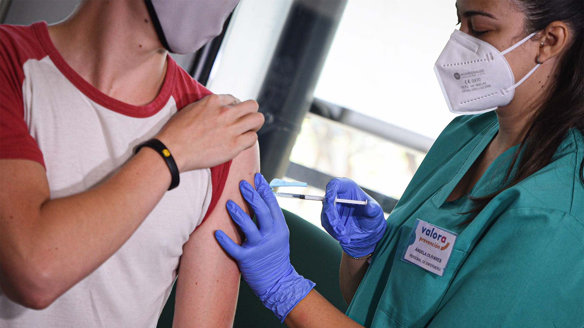 A child receives the Moderna Covid-19 vaccine. 