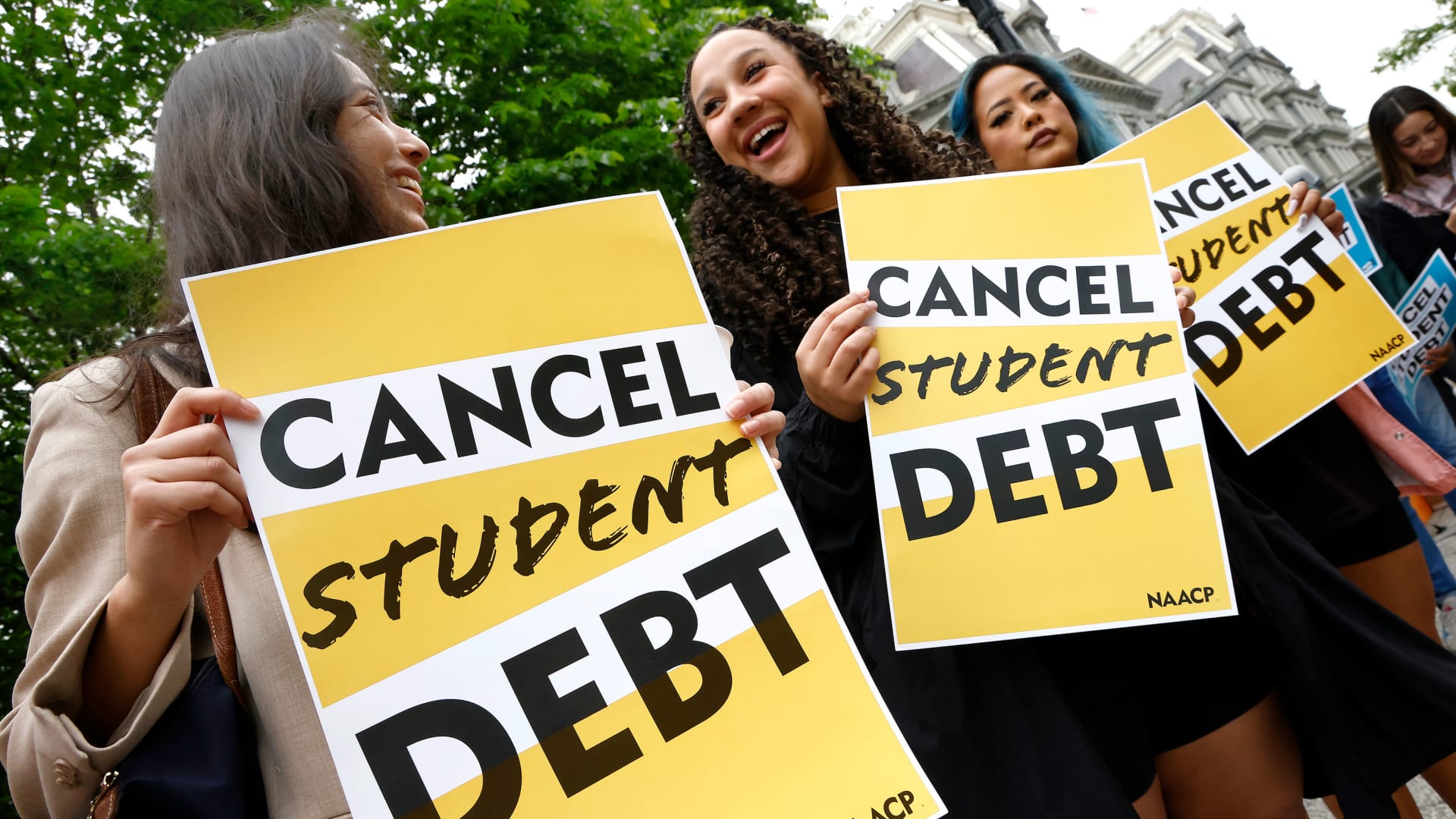 Student-loan borrowers gather near the White House in May 2020.