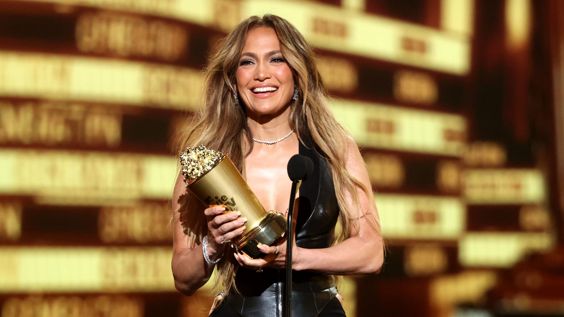 Jennifer Lopez accepts the MTV Generation Award onstage during the 2022 MTV Movie & TV Awards.