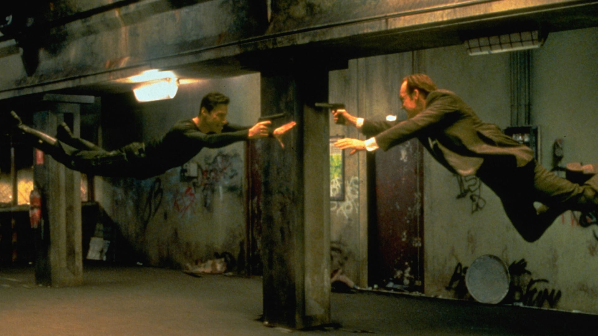 Keanu Reeves and Hugo Weaving in the 1999 movie 'The Matrix.'