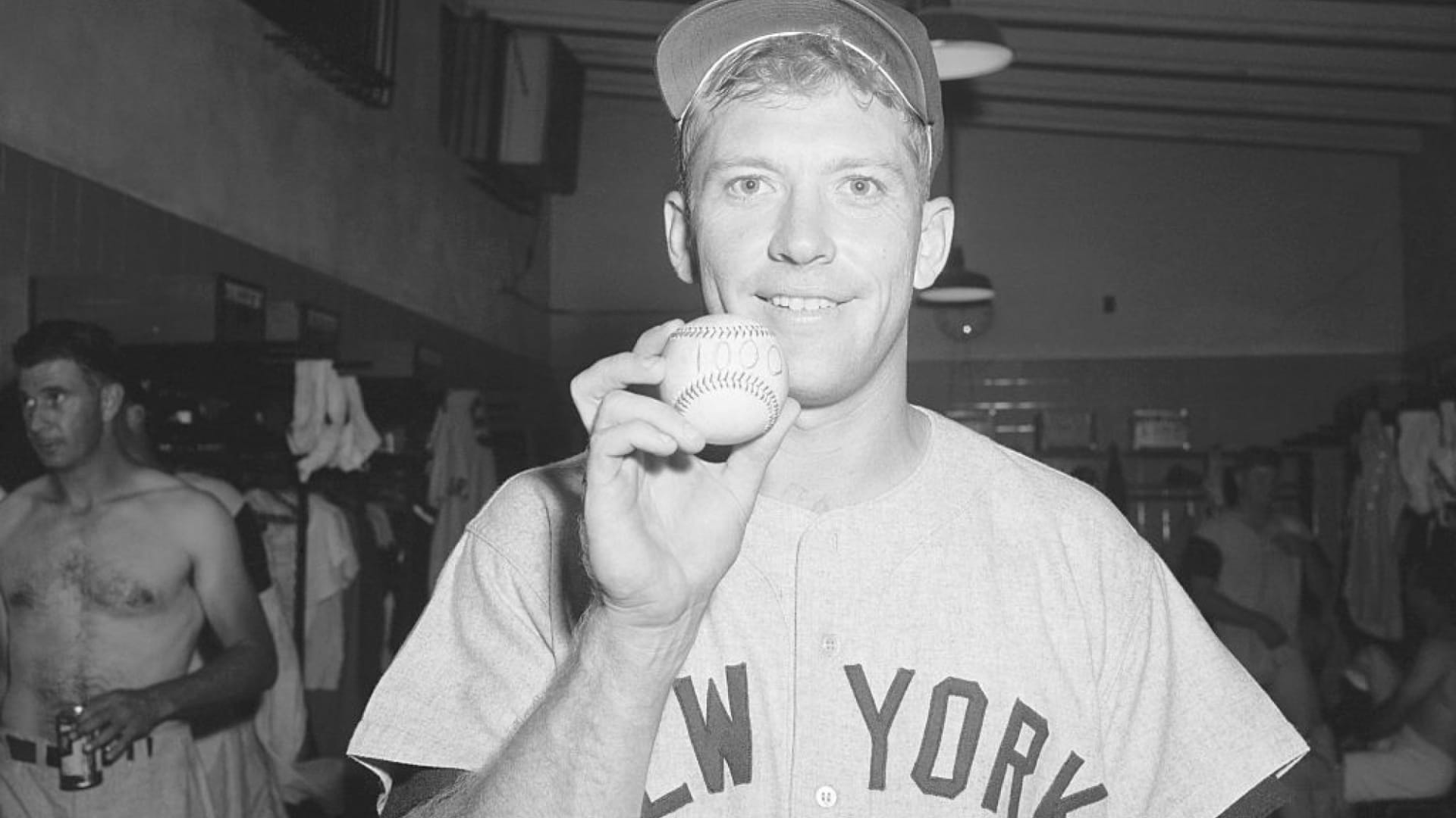 Mickey Mantle in 1957, when he got his 1,000th base hit.