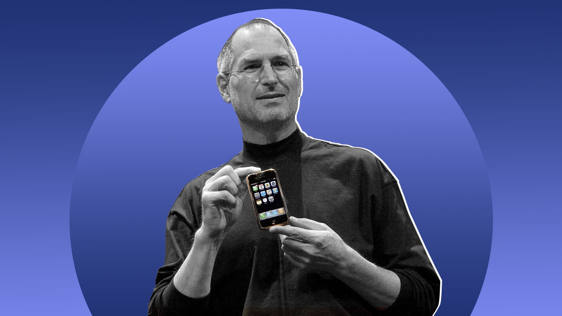 Steve Jobs holds up the first iPhone when it was introduced at Macworld in 2007.
